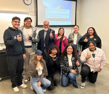 Arturo Durazo and a group of students